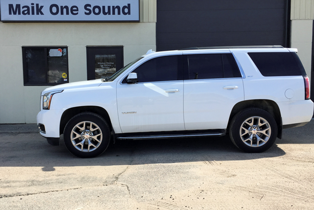 GMC 2019 Yukon with professional window tint in North Bay